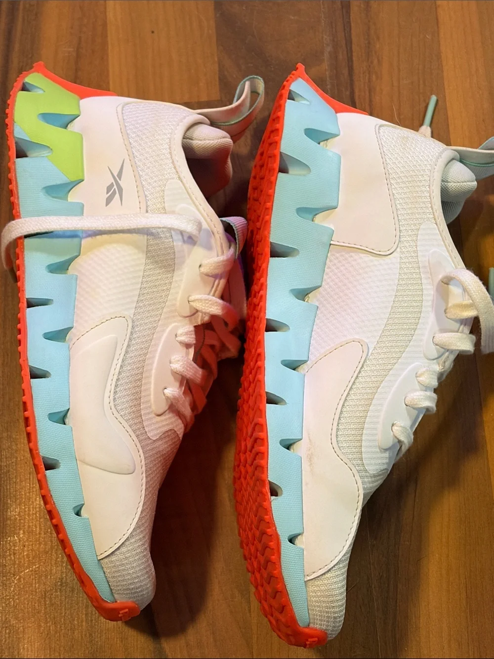 Reebok Kids White Sneakers with Teal and Orange Accents